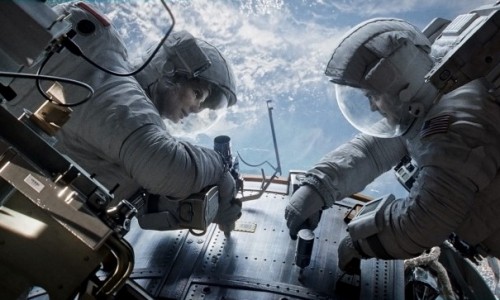 Another day at the office for Sandra Bullock and George Clooney, before disaster strikes in the sublime Gravity
