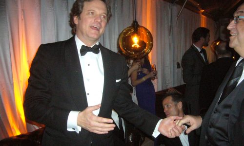 Colin Firth being congratulated on his Golden Globe win at an after-party