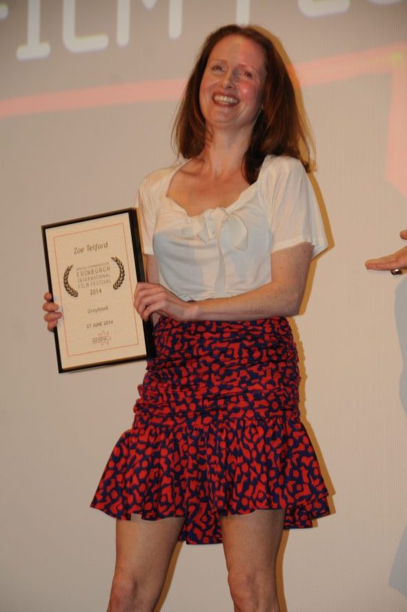 Actress Zoe Telford, the runner-up to absent winner Eddie Marsan in the Best Performance in a British Film category