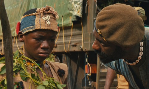 Best Male Lead Abraham Attah (left) with Best Supporting Male Idris Elba in Beats of No Nation